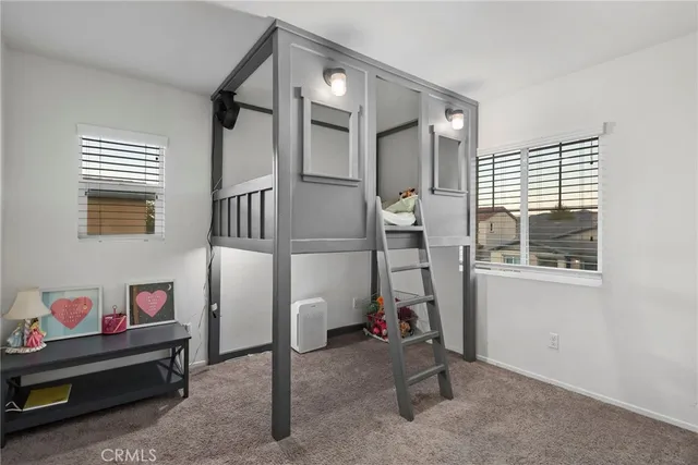 a view of a room with wooden floor and closet