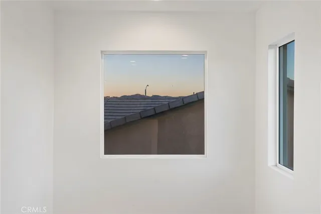 a view of a hallway with entryway