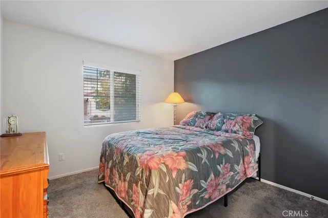a dining room with furniture and a window