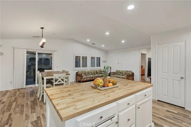 a view of dining table and chairs