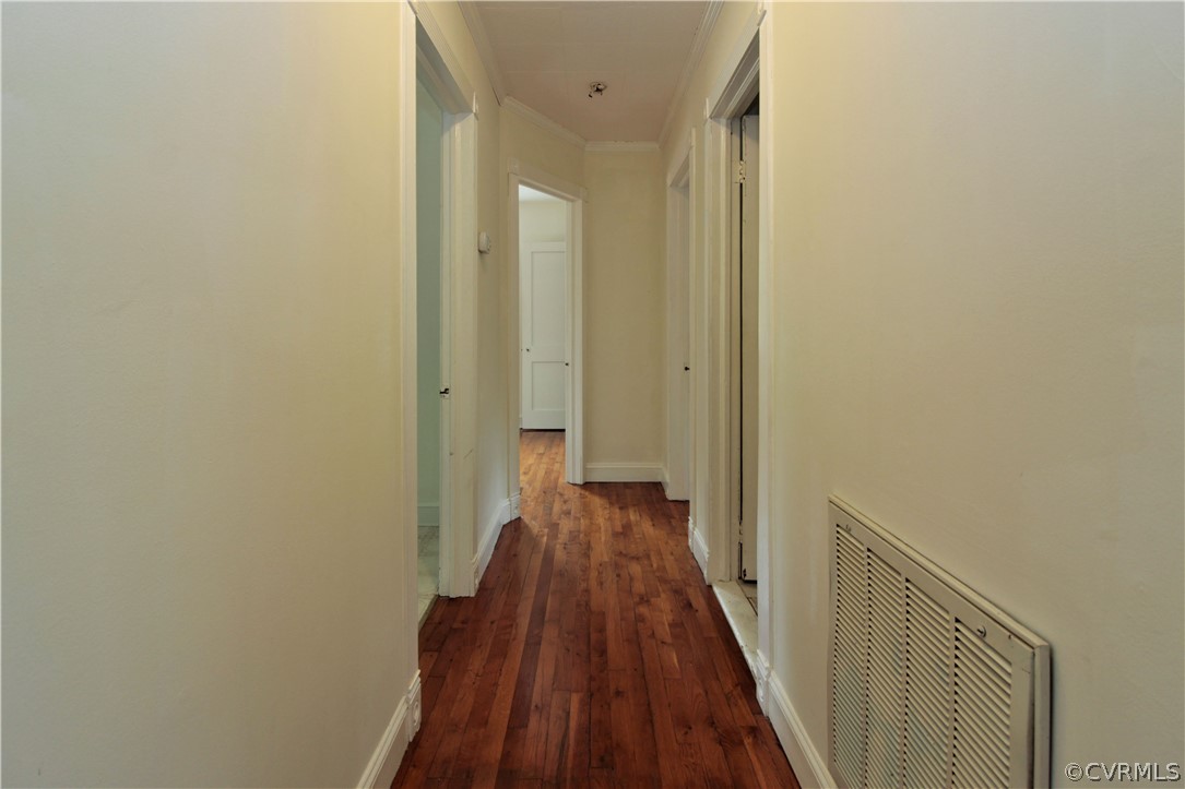 15913 Harrowgate Road Chester, VA 23831 - Photo 5 of 20 a view of a hallway with wooden floor