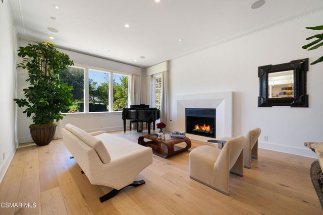 a view of entryway with livingroom and stairs