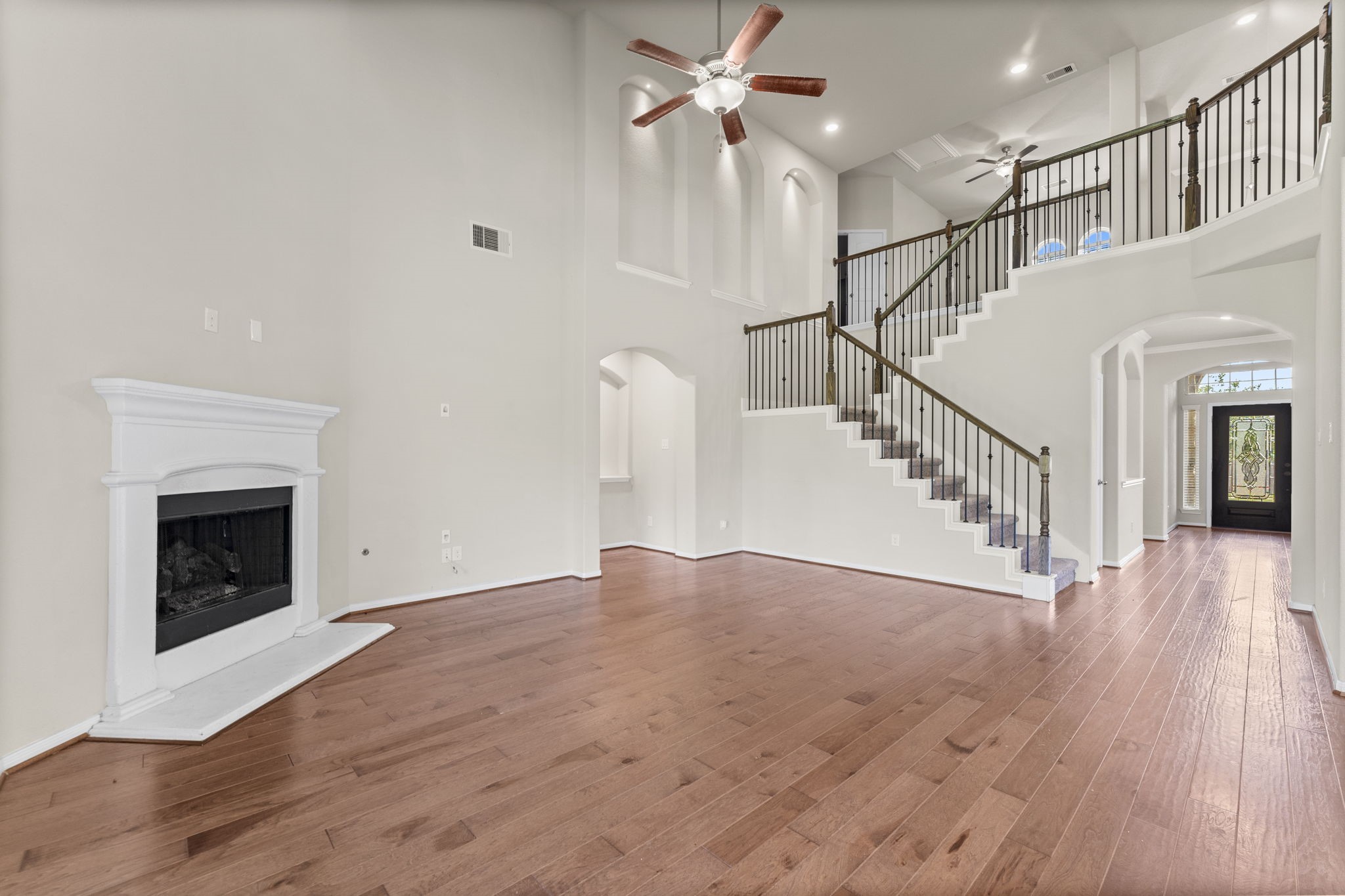 5015 Gold Lantana Trail Spring, TX 77389 - Photo 15 of 50 a view of entryway and hall with wooden floor