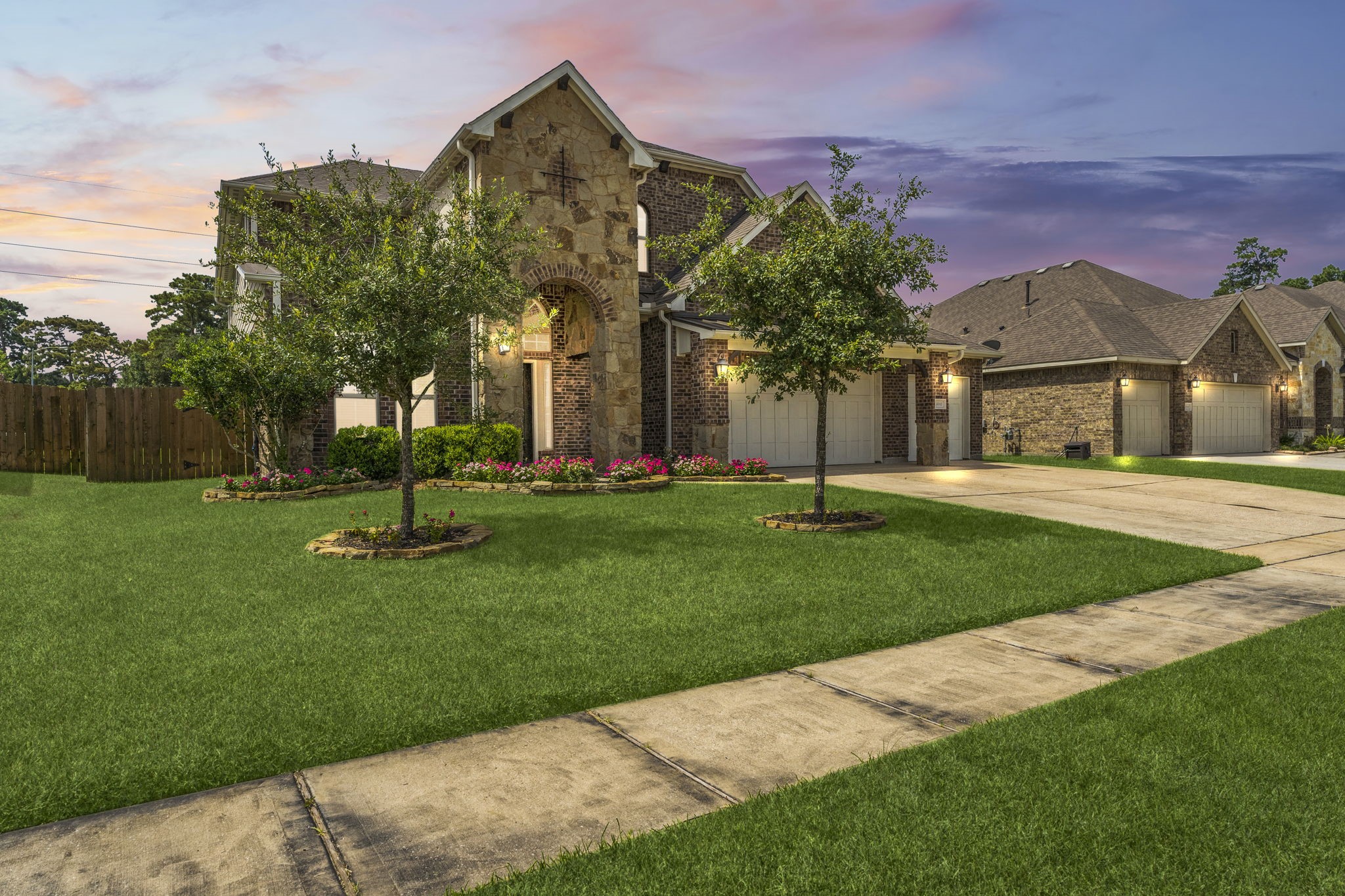 5015 Gold Lantana Trail Spring, TX 77389 - Photo 2 of 50 a front view of a building with a garden