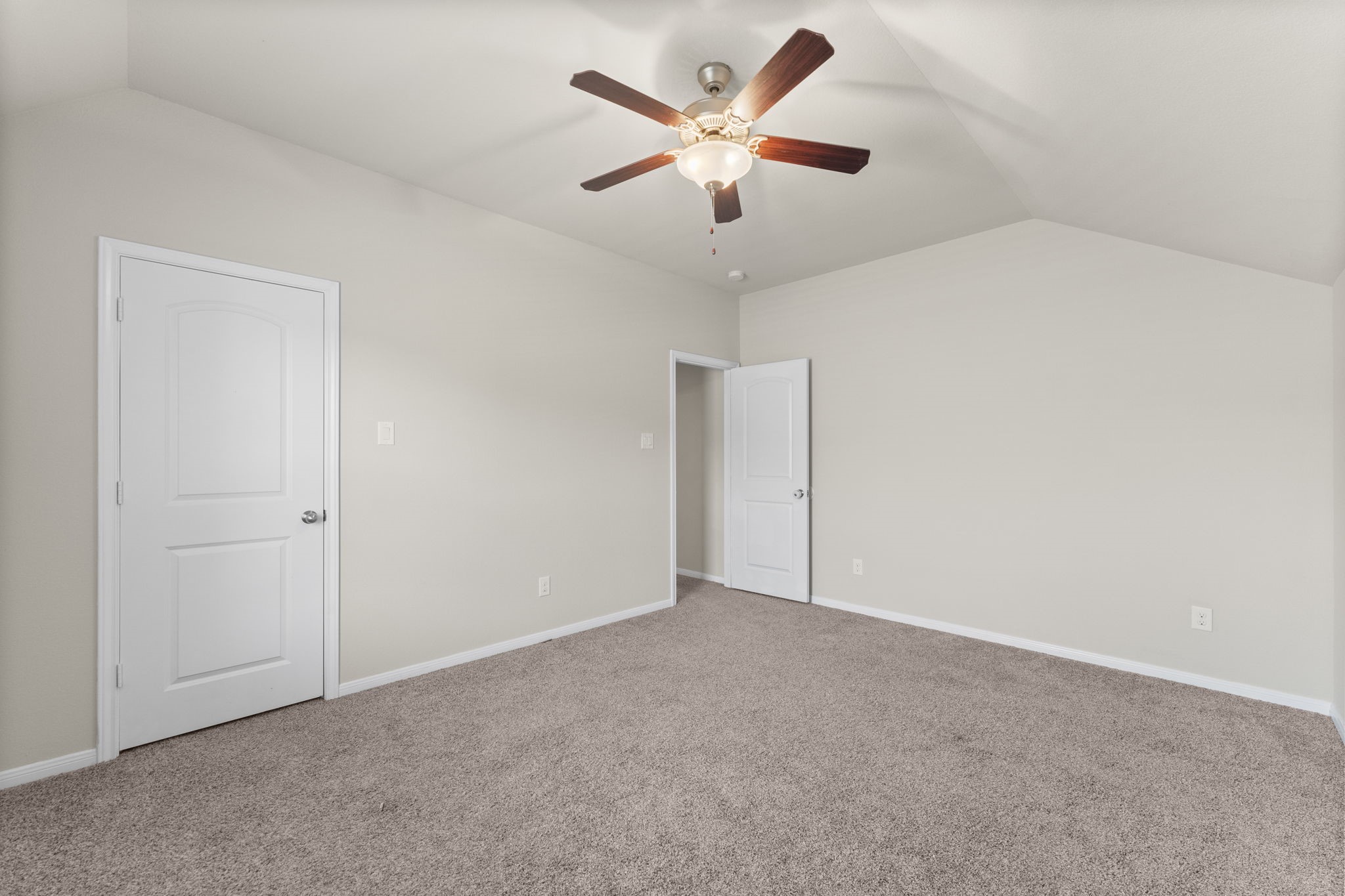 5015 Gold Lantana Trail Spring, TX 77389 - Photo 38 of 50 an empty room with a ceiling fan and a ceiling fan