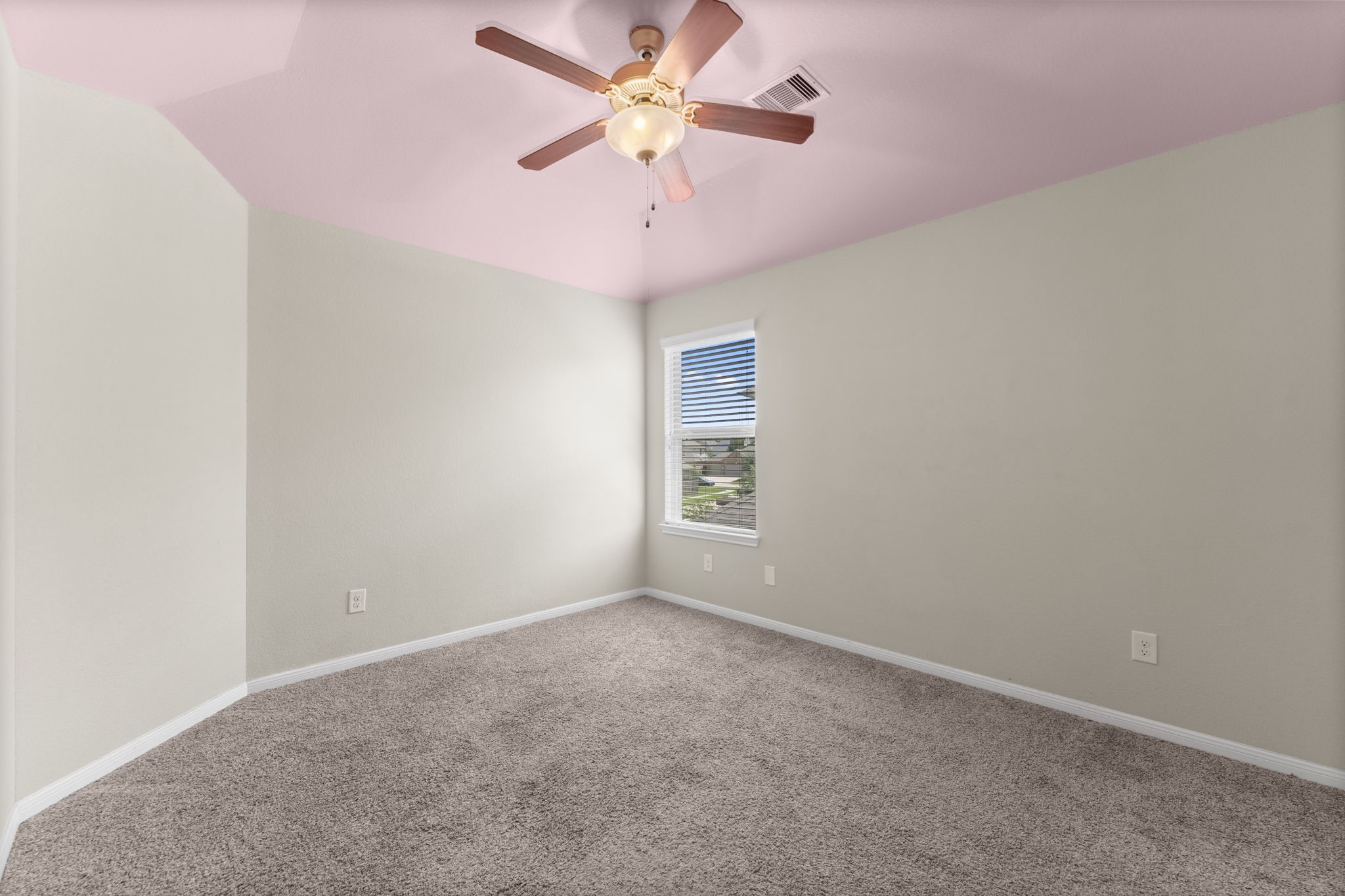 5015 Gold Lantana Trail Spring, TX 77389 - Photo 39 of 50 an empty room with a window and a fan