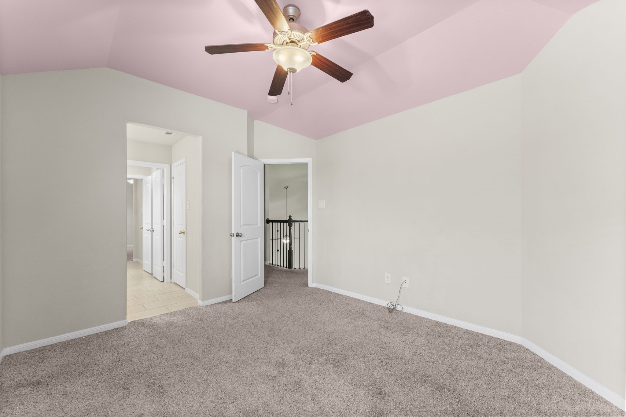 5015 Gold Lantana Trail Spring, TX 77389 - Photo 40 of 50 a view of a big room with a ceiling fan and a ceiling fan