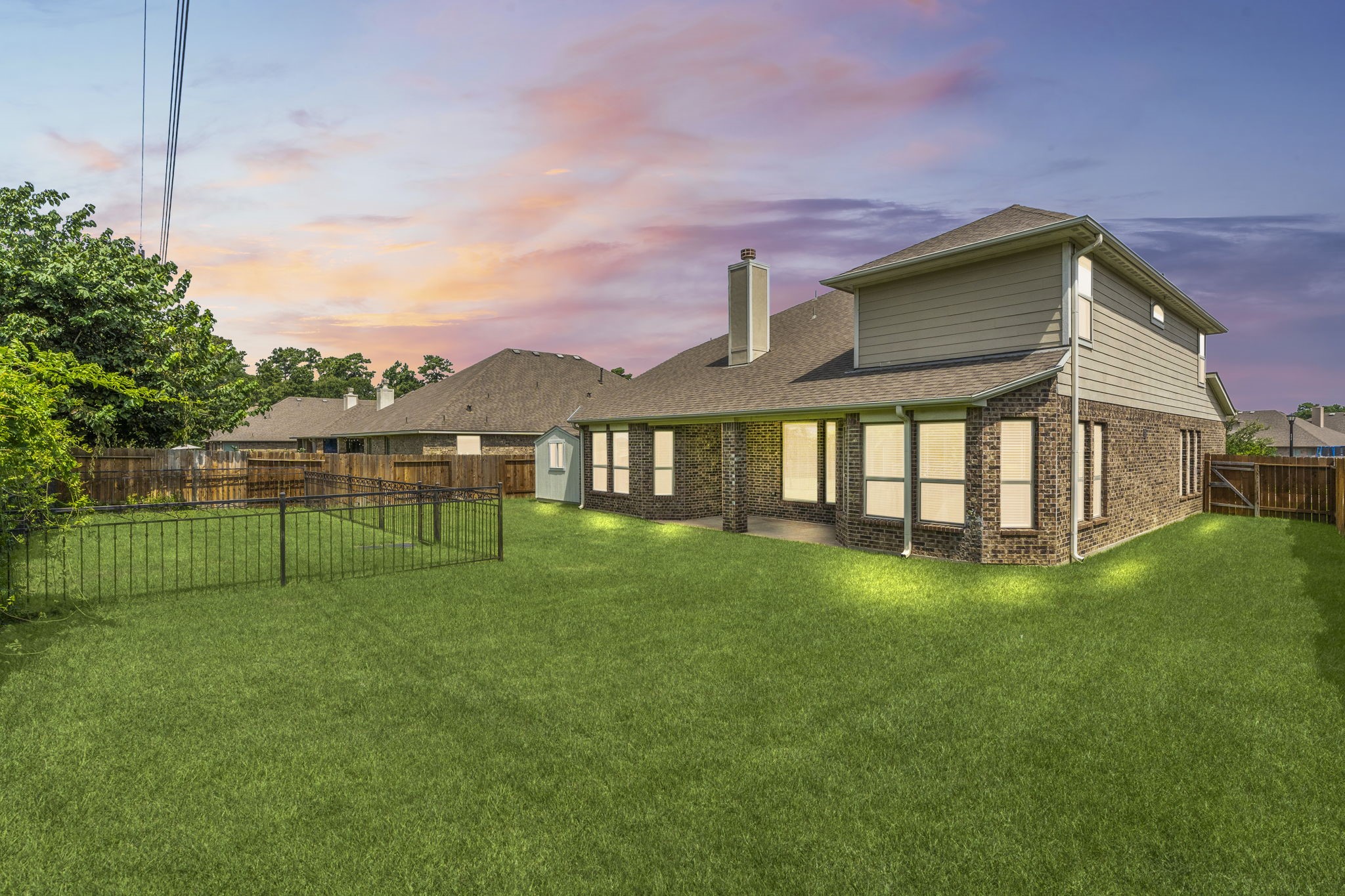 5015 Gold Lantana Trail Spring, TX 77389 - Photo 46 of 50 a view of a house with a backyard