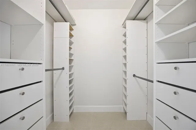 a bathroom with a sink toilet and vanity
