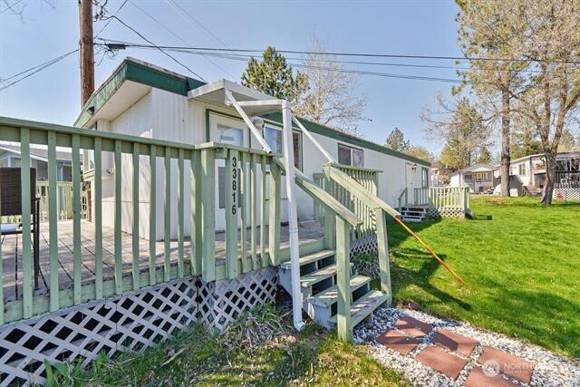 33816 Aztec Lane Cheney, WA 99004 - Photo 11 of 24 a view of house with a yard