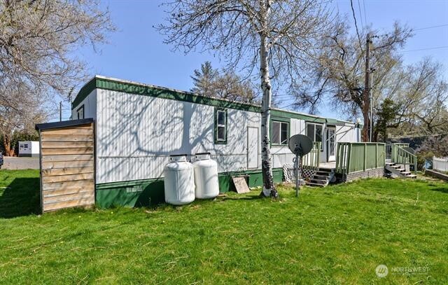 33816 Aztec Lane Cheney, WA 99004 - Photo 13 of 24 a view of a chair and table in the yard