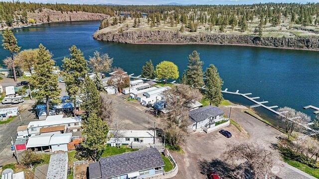 33816 Aztec Lane Cheney, WA 99004 - Photo 21 of 24 an aerial view of a house with a lake view