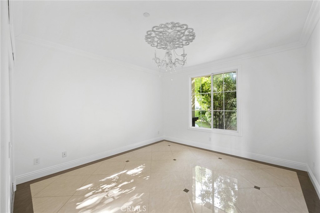 7370 West Chantilly Court Tujunga, CA 91042 - Photo 17 of 55 an empty room with a window