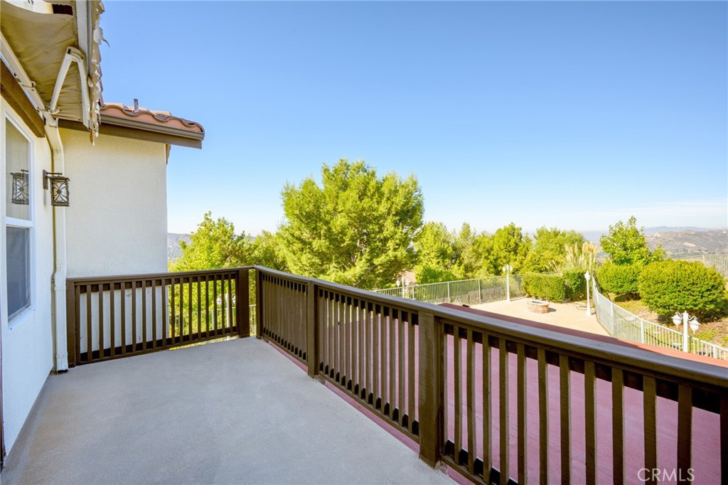7370 West Chantilly Court Tujunga, CA 91042 - Photo 25 of 55 a view of a balcony with wooden fence