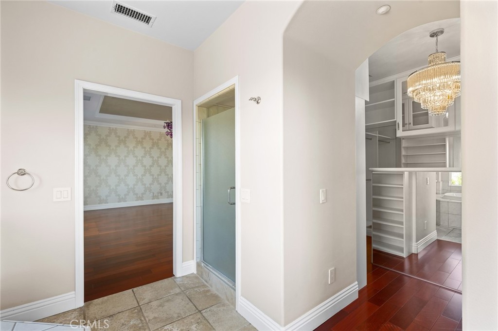 7370 West Chantilly Court Tujunga, CA 91042 - Photo 28 of 55 a view of walk in closet with wooden floor