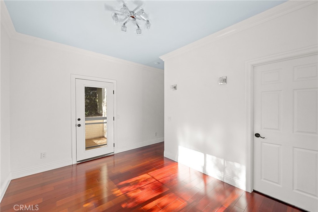 7370 West Chantilly Court Tujunga, CA 91042 - Photo 31 of 55 a view of a hallway with wooden floor