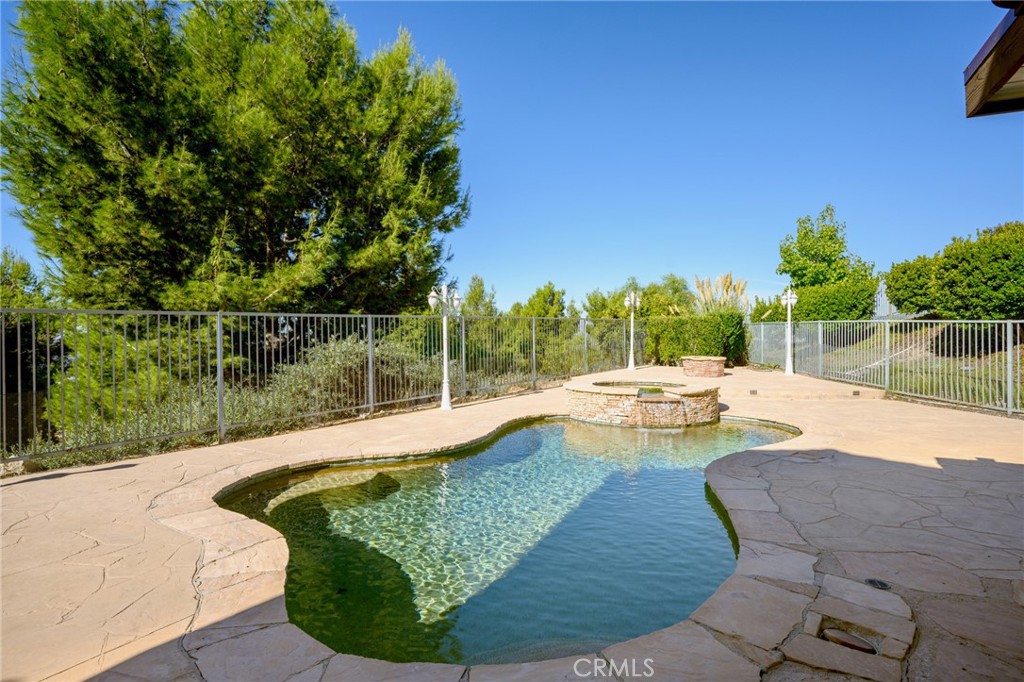 7370 West Chantilly Court Tujunga, CA 91042 - Photo 45 of 55 a view of a swimming pool with lounge chair