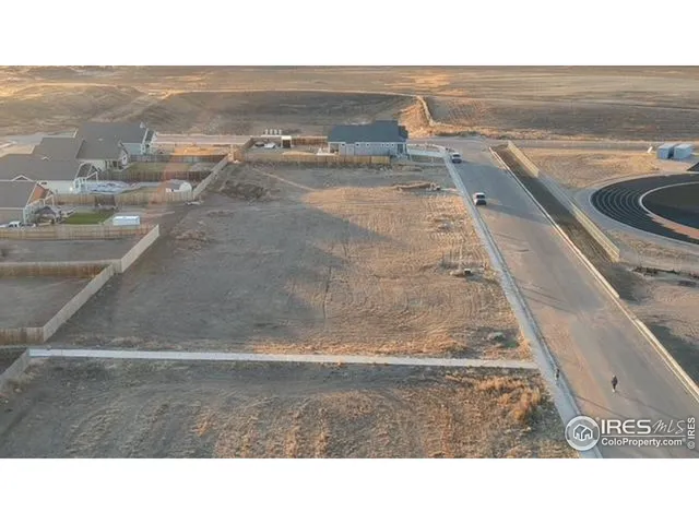 a black and white photo of a living room