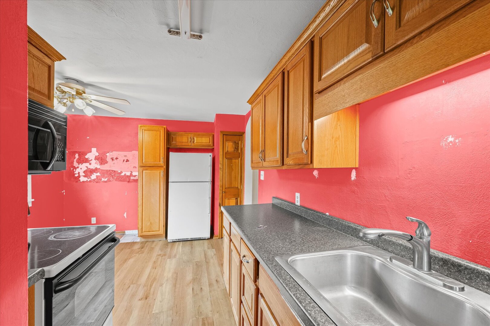 3 Morfey Court Monticello, IL 61856 - Photo 15 of 32 a kitchen with a sink cabinets and a stove