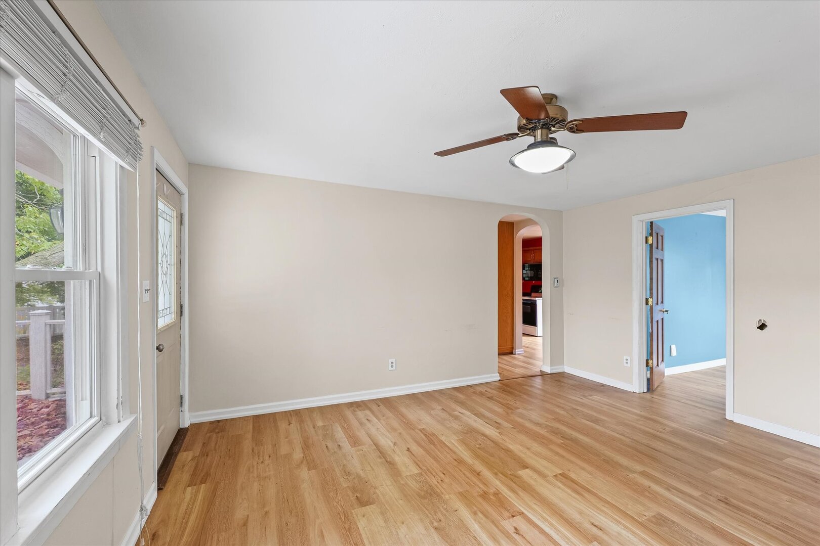 3 Morfey Court Monticello, IL 61856 - Photo 7 of 32 wooden floor in an empty room with a window