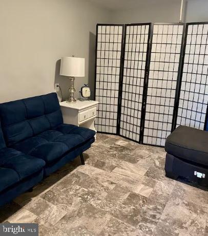 1410 Fleming Park Road Mount Jackson, VA 22842 - Photo 12 of 14 a living room with a couch and a lamp