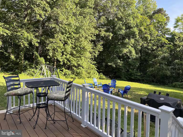 1410 Fleming Park Road Mount Jackson, VA 22842 - Photo 13 of 14 a view of a chairs and table on the wooden floor
