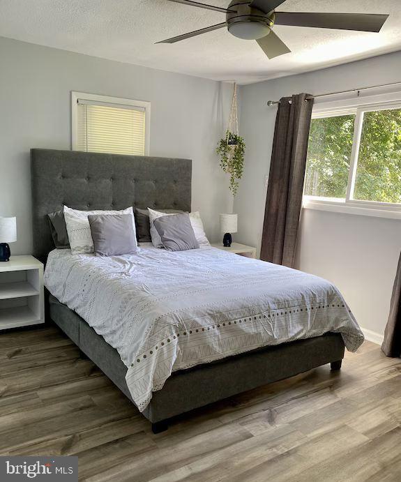 1410 Fleming Park Road Mount Jackson, VA 22842 - Photo 5 of 14 a large bed sitting in a bedroom next to a window