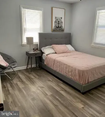 a bedroom with a bed and a table