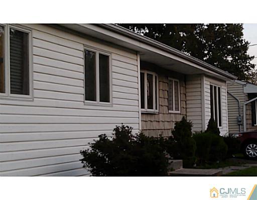 3046 Cheesequake Road Old Bridge, NJ 08859 - Photo 1 of 16 a black and white photo of a house