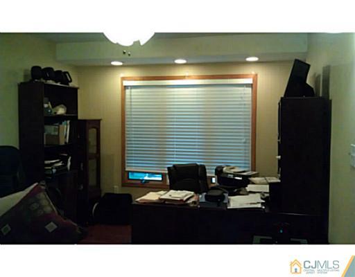 3046 Cheesequake Road Old Bridge, NJ 08859 - Photo 4 of 16 a black and white photo of a living room