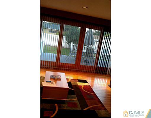 3046 Cheesequake Road Old Bridge, NJ 08859 - Photo 6 of 16 a view of a balcony with a couch