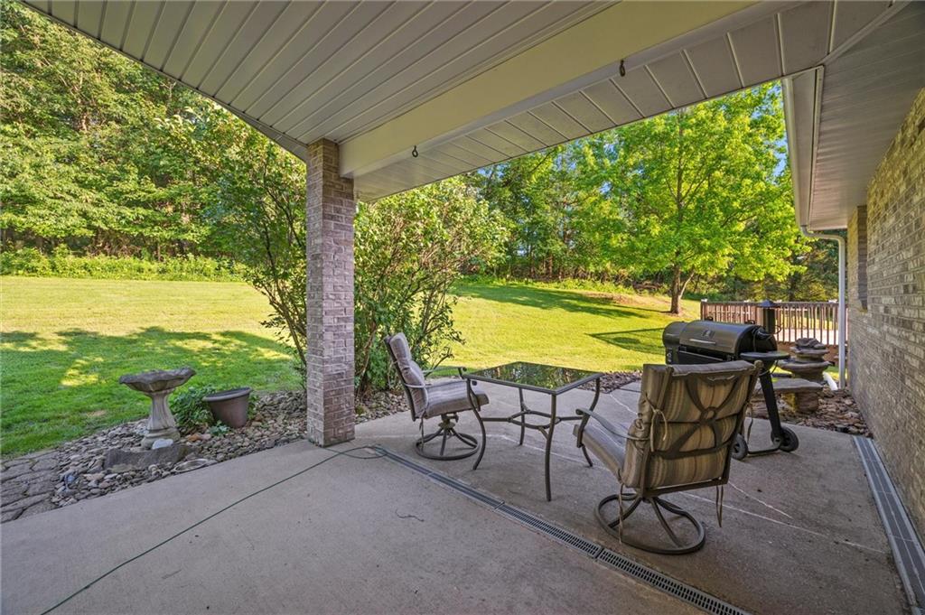206 Harbison Road Sarver, PA 16055 - Photo 22 of 46 a view of an outdoor space with a table and chairs