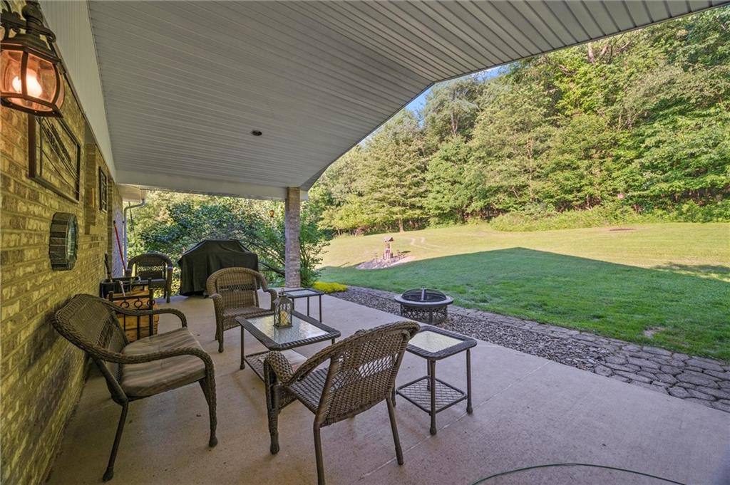 206 Harbison Road Sarver, PA 16055 - Photo 23 of 46 a patio with table and chairs