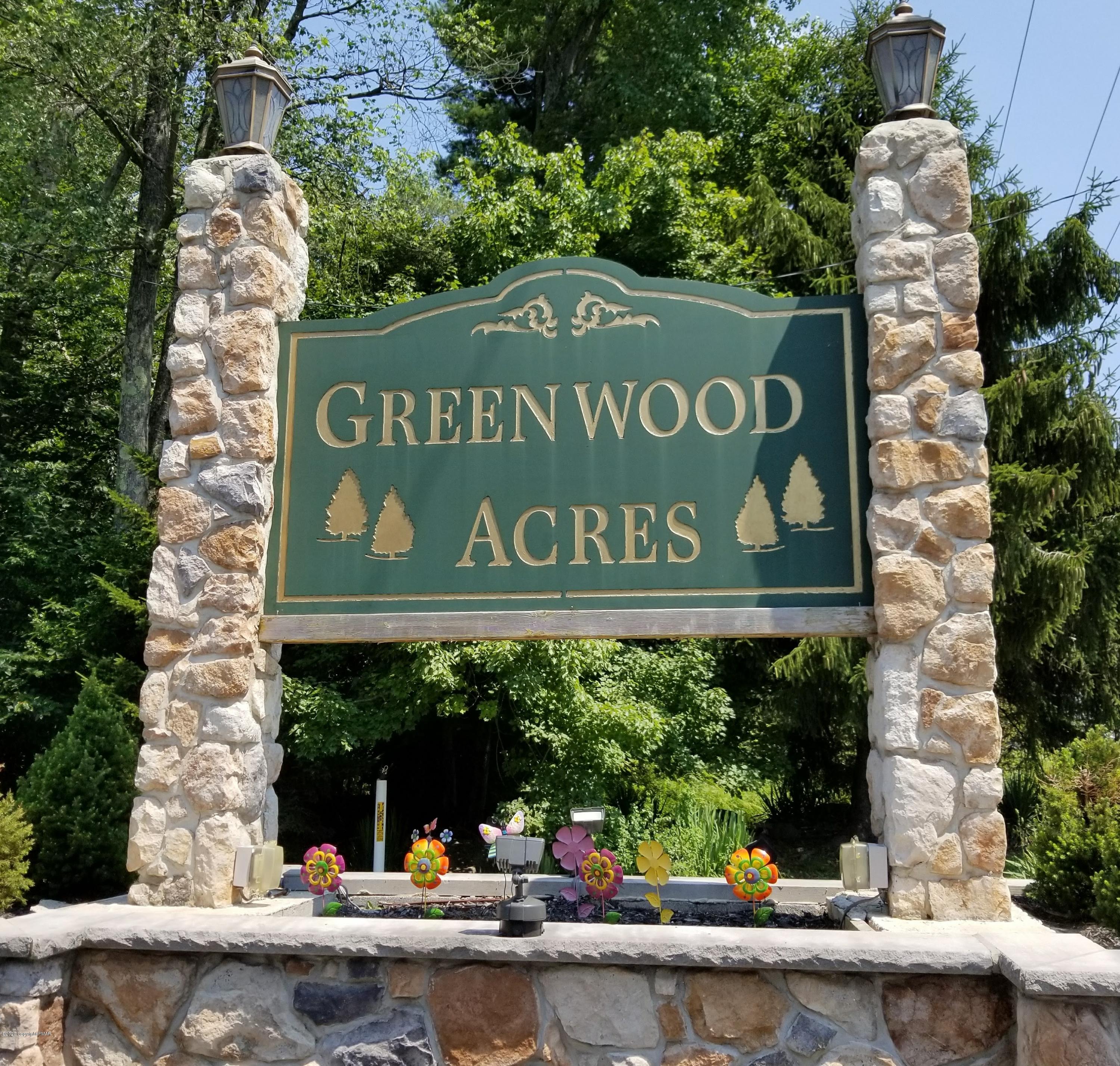 39 Lidio Road Blakeslee, PA 18610 - Photo 3 of 14 a view of a sign board with a house and cars parked
