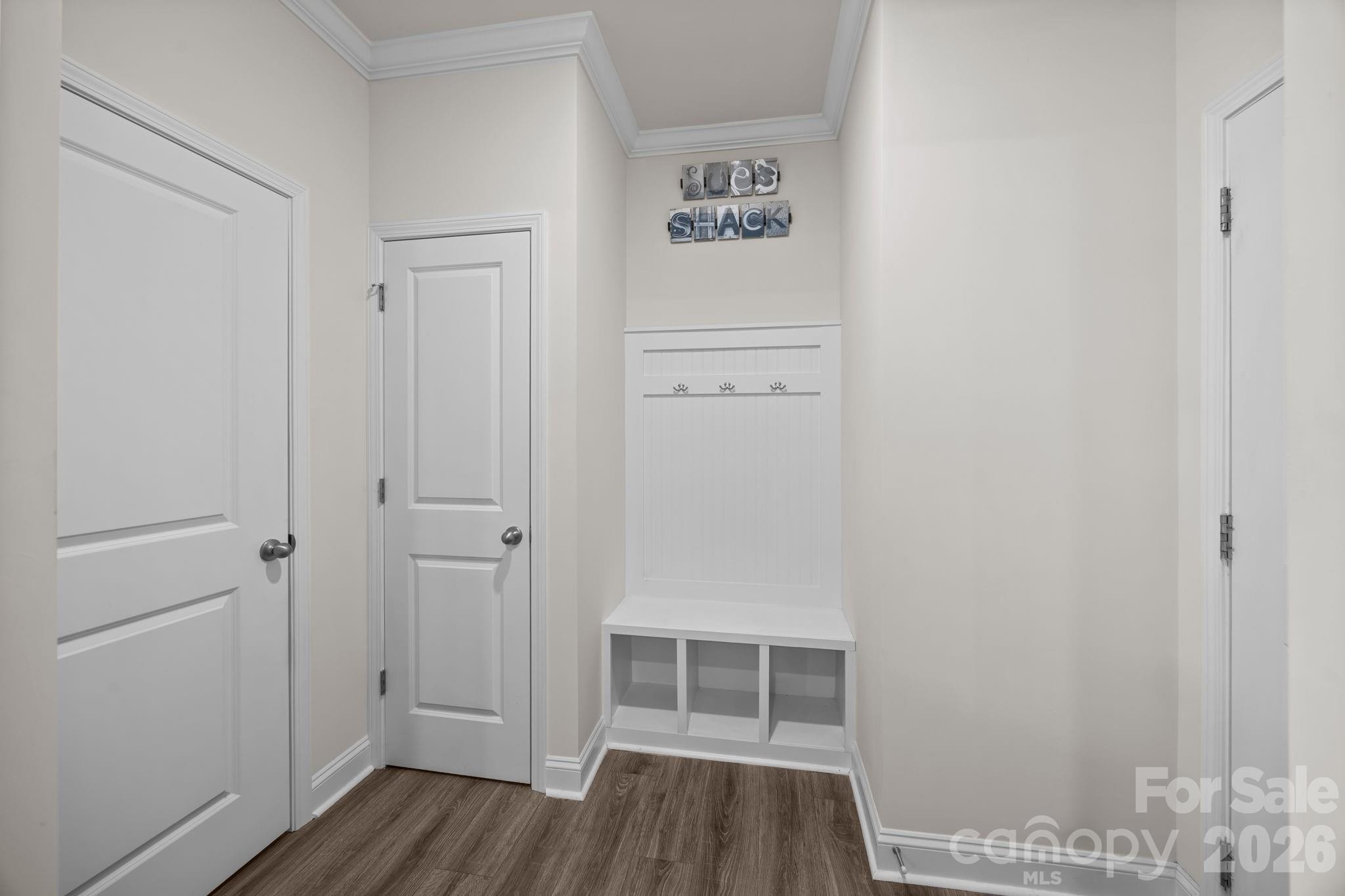 7895 Iron Road Sherrills Ford, NC 28673 - Photo 13 of 38 a view of walk in closet with wooden floor