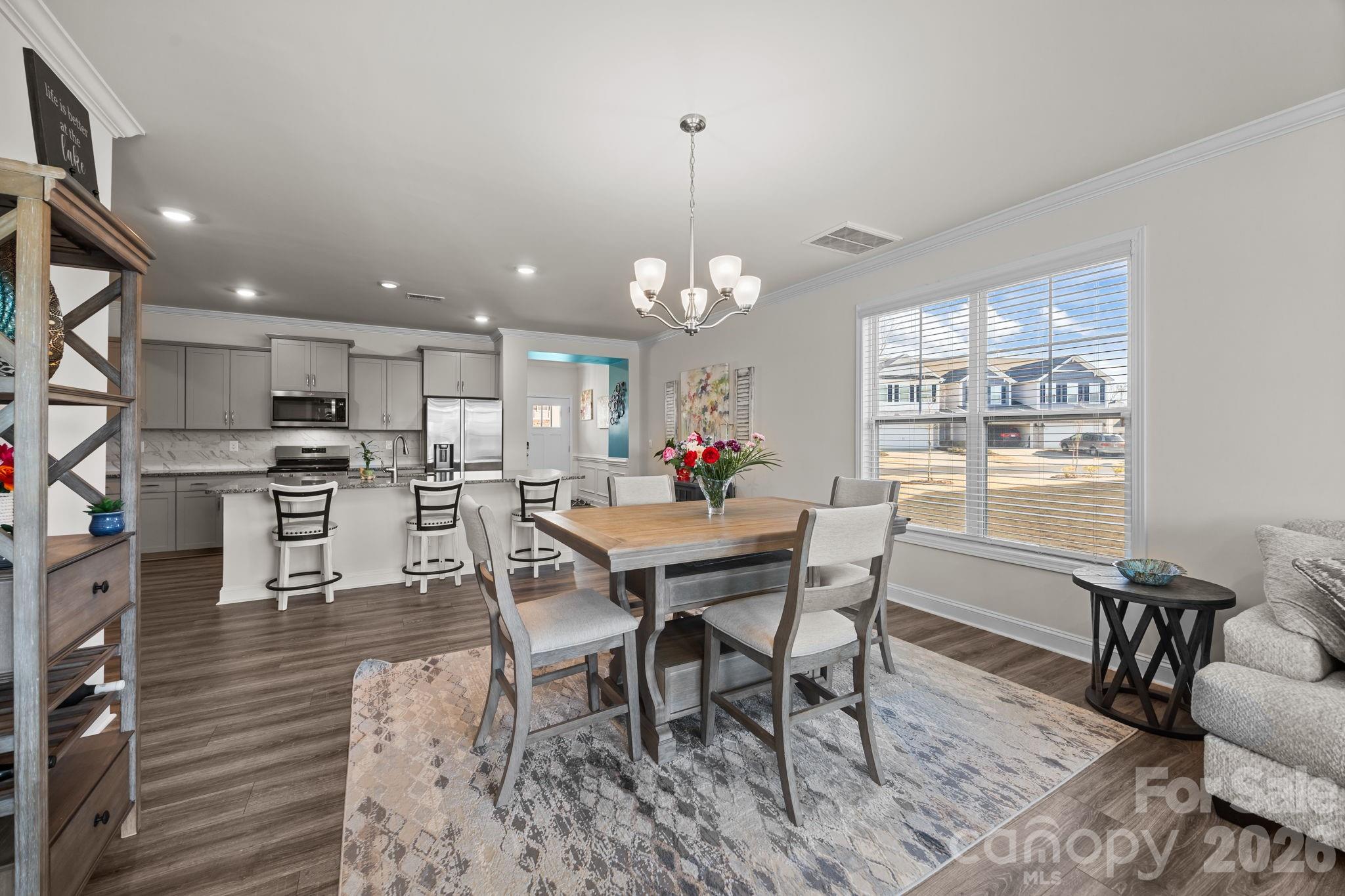 7895 Iron Road Sherrills Ford, NC 28673 - Photo 15 of 38 a view of a dining room with furniture window and outside view