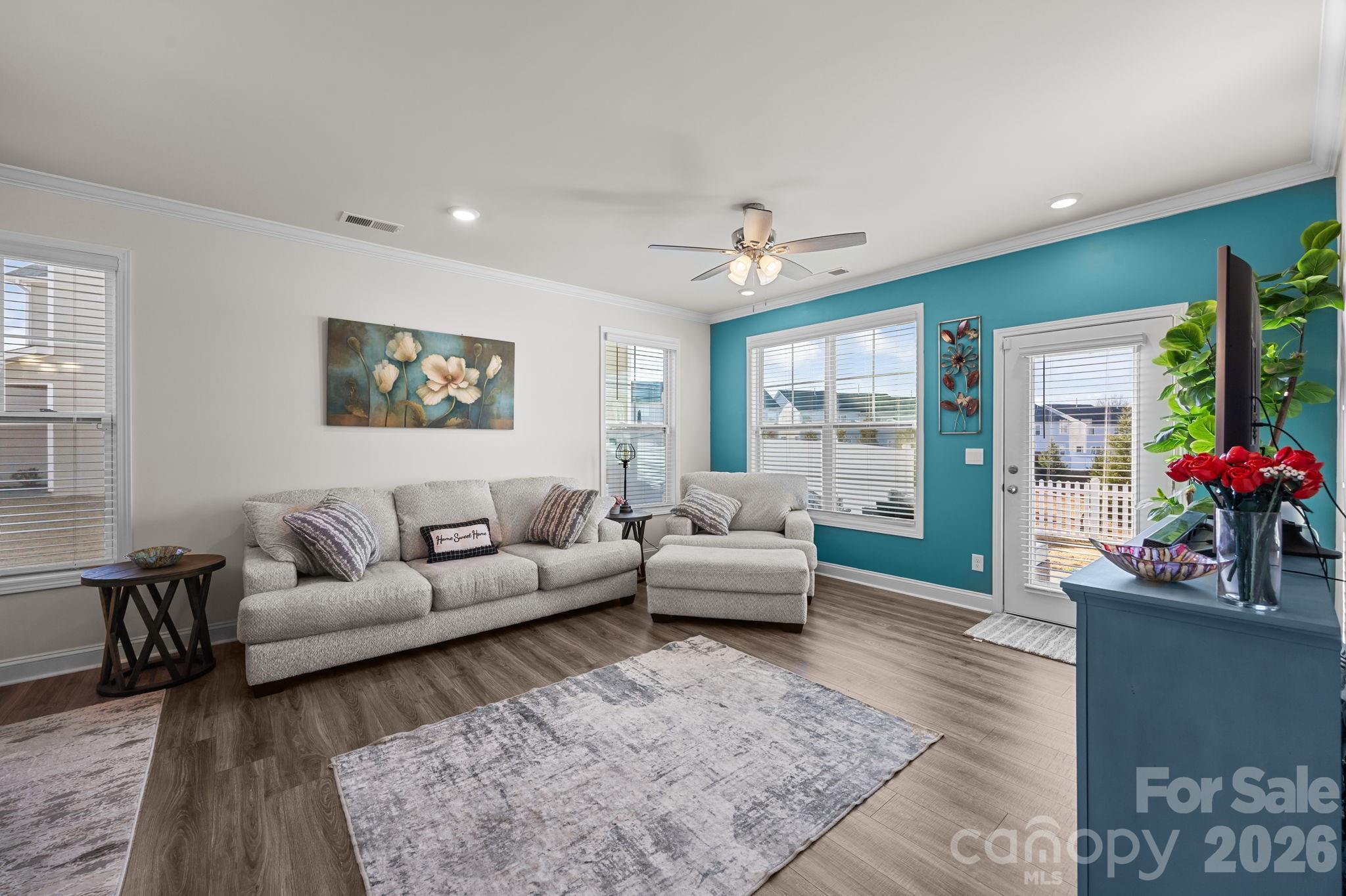 7895 Iron Road Sherrills Ford, NC 28673 - Photo 16 of 38 a living room with furniture and a large window