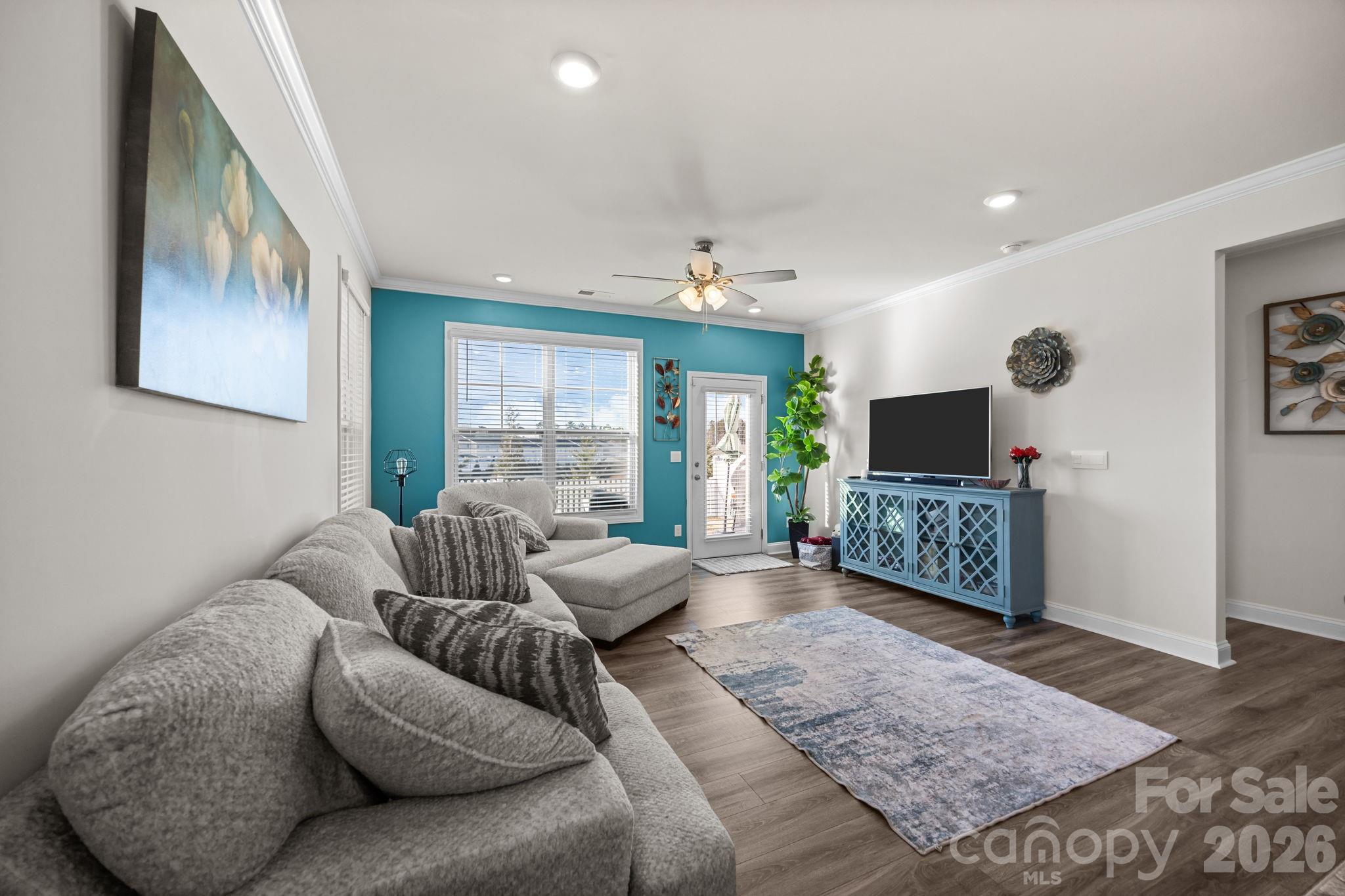 7895 Iron Road Sherrills Ford, NC 28673 - Photo 17 of 38 a living room with furniture and a flat screen tv