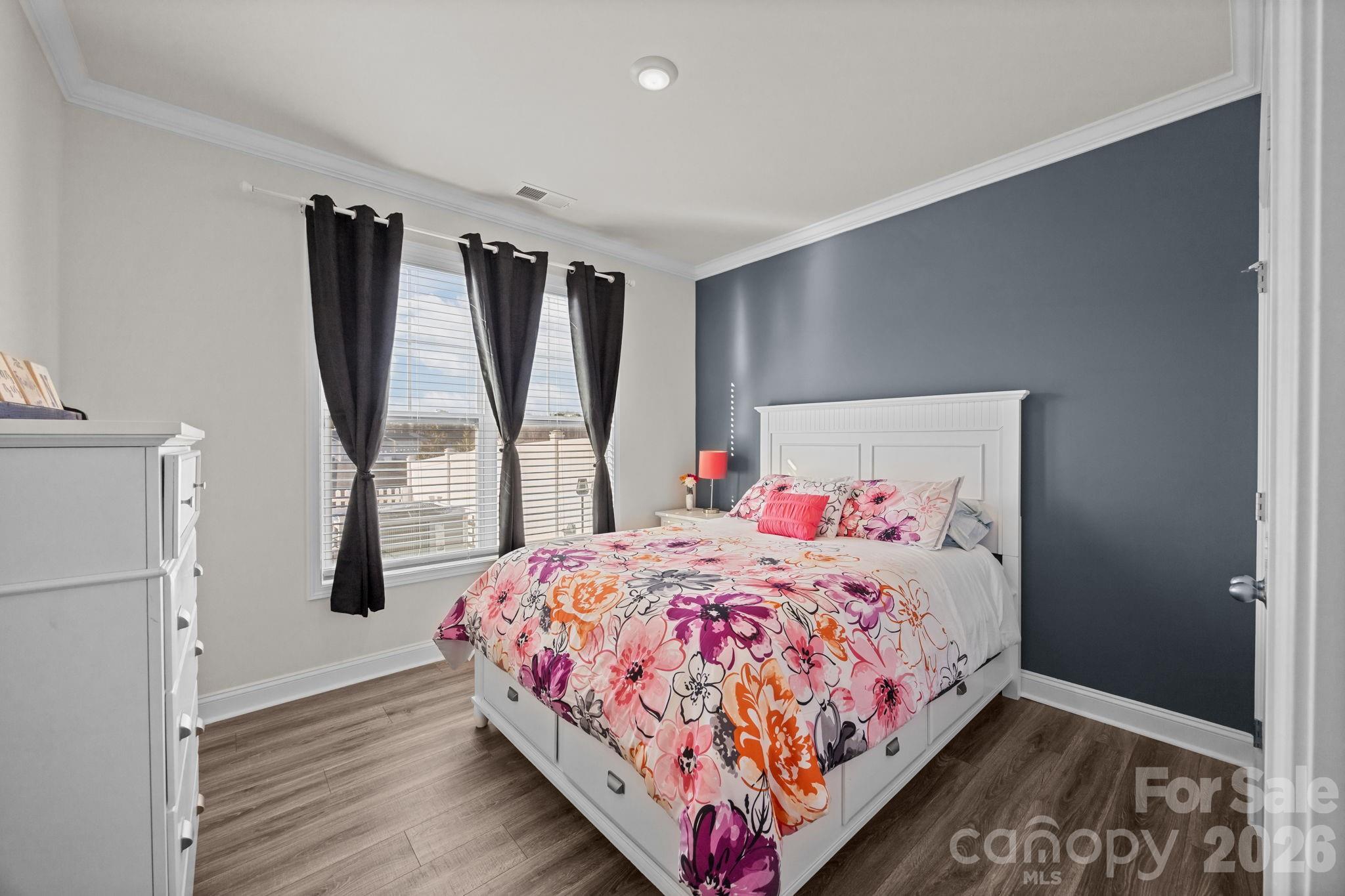 7895 Iron Road Sherrills Ford, NC 28673 - Photo 19 of 38 a bedroom with a bed and a window