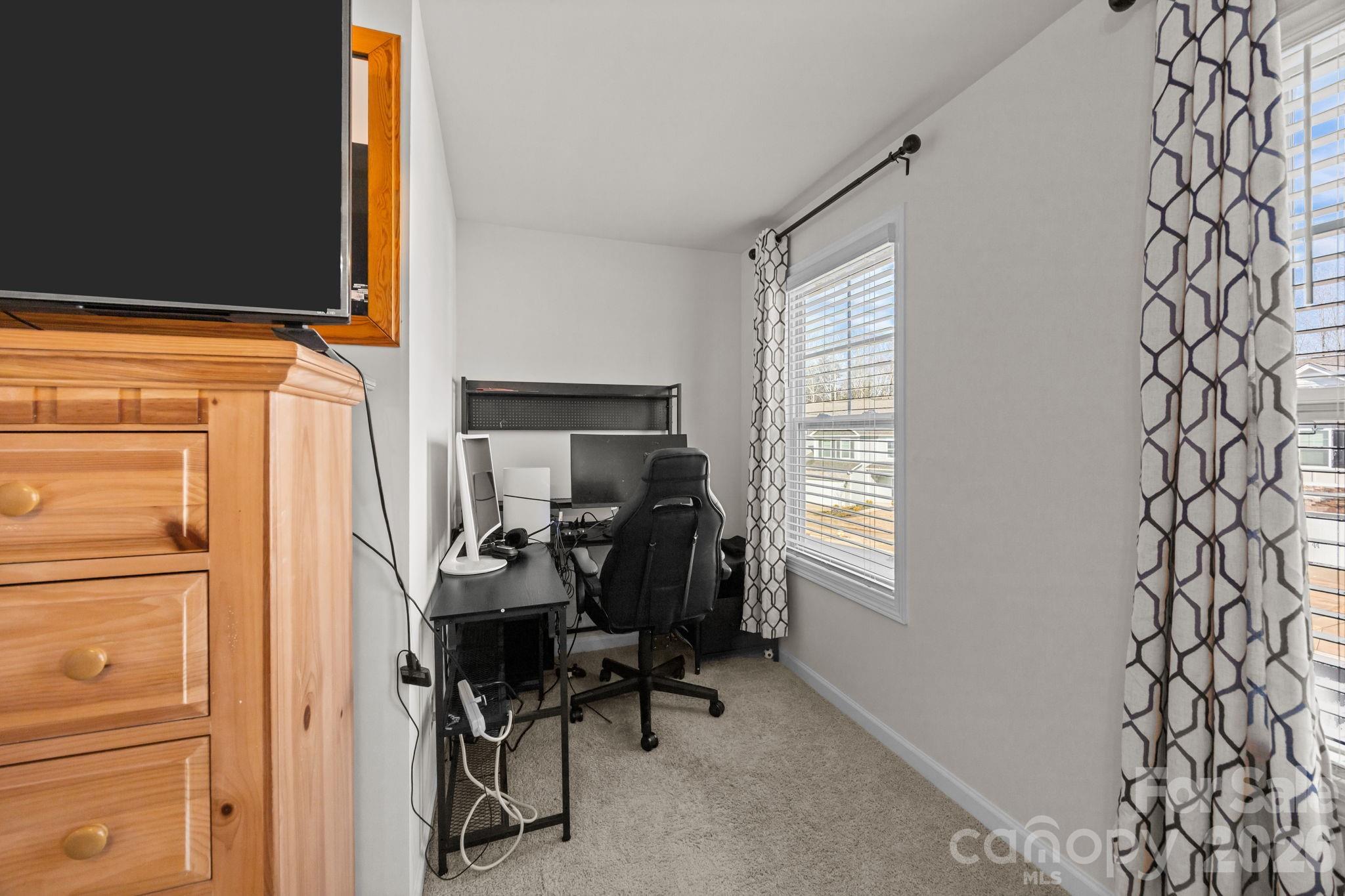 7895 Iron Road Sherrills Ford, NC 28673 - Photo 25 of 38 a view of a workspace with furniture and a window