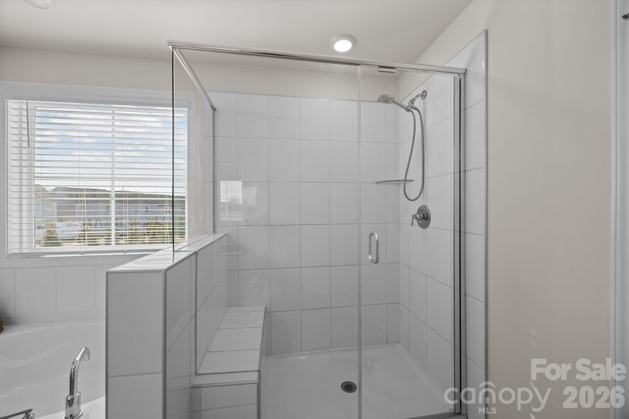 7895 Iron Road Sherrills Ford, NC 28673 - Photo 29 of 38 a bathroom with a shower and a window