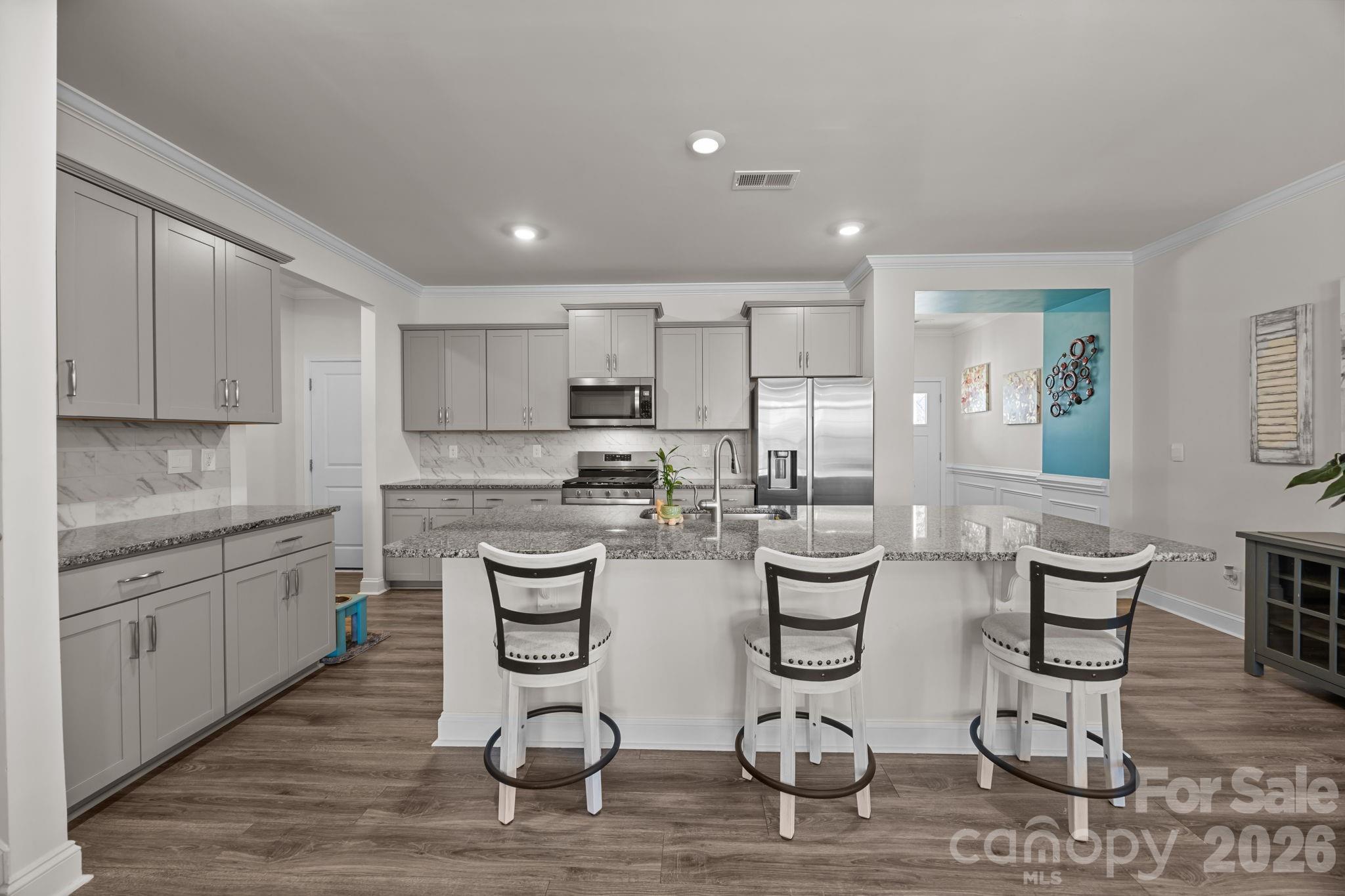 7895 Iron Road Sherrills Ford, NC 28673 - Photo 5 of 38 a kitchen with lots of counter space and appliances