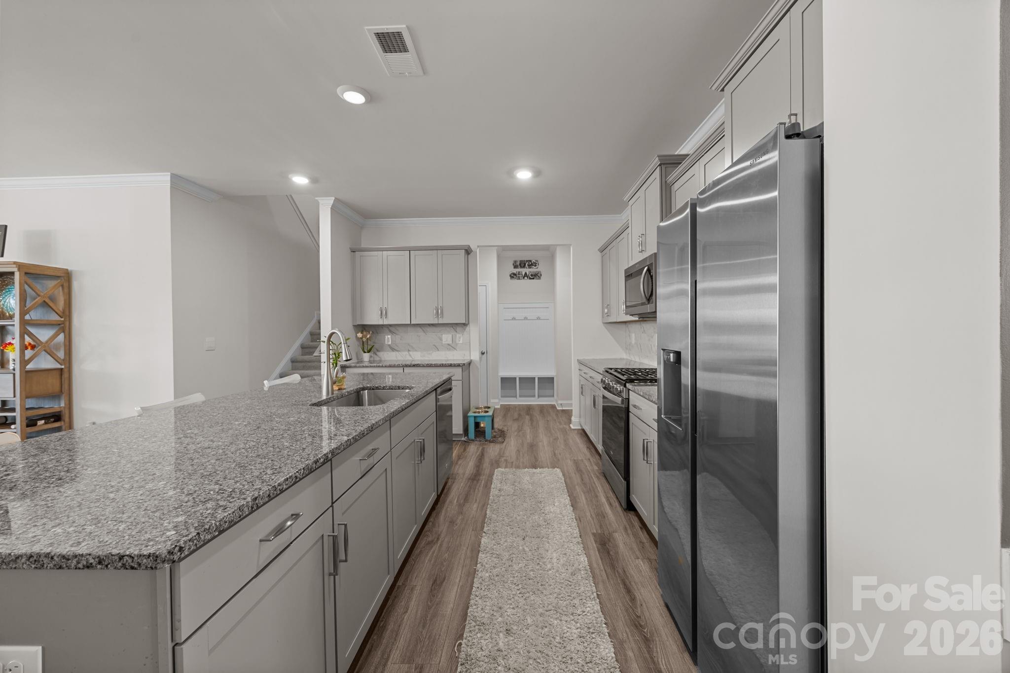 7895 Iron Road Sherrills Ford, NC 28673 - Photo 7 of 38 a kitchen with a sink and refrigerator