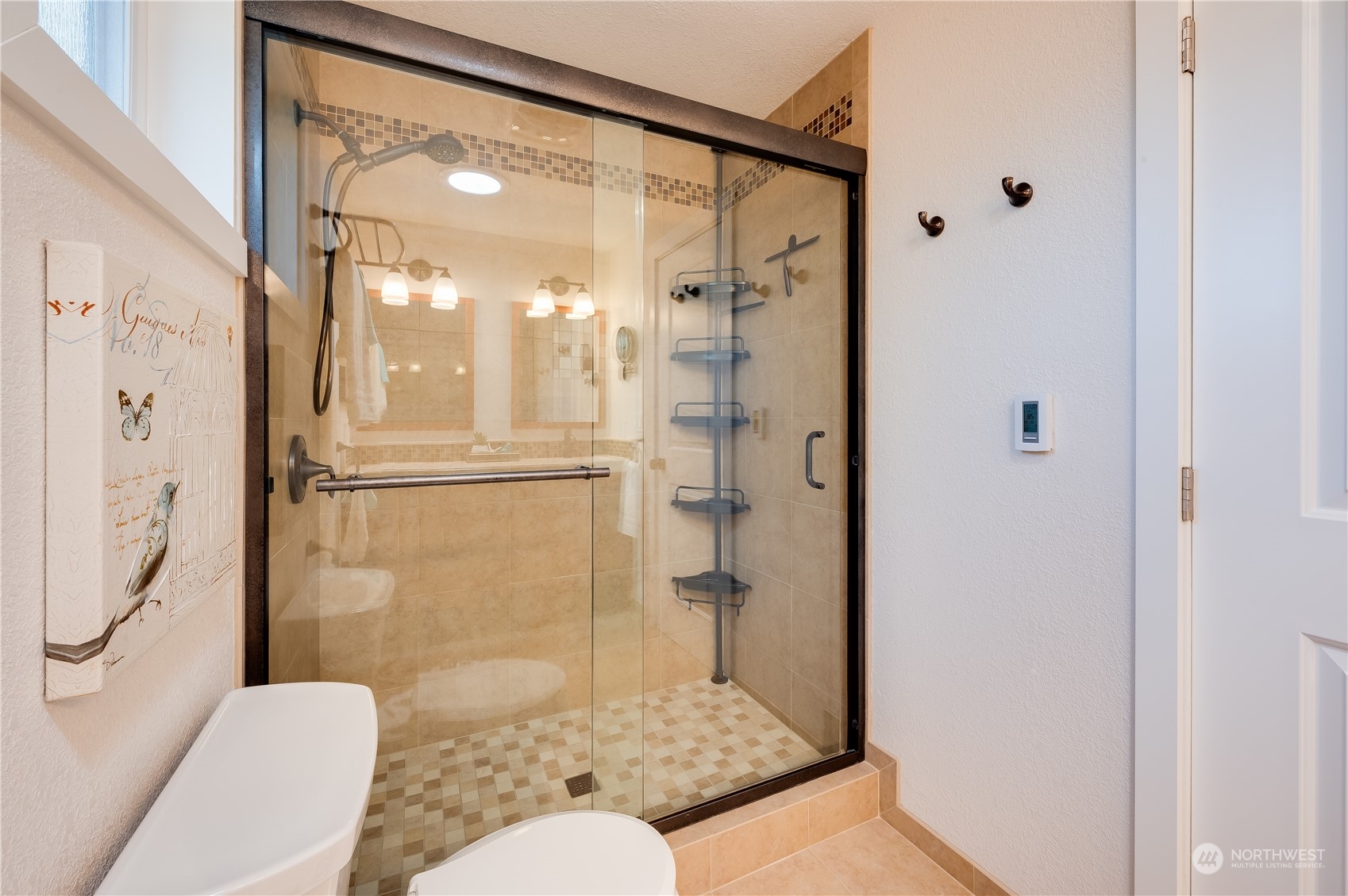 24224 16th Place Southeast Bothell, WA 98021 - Photo 22 of 37 a bathroom with a shower and a toilet