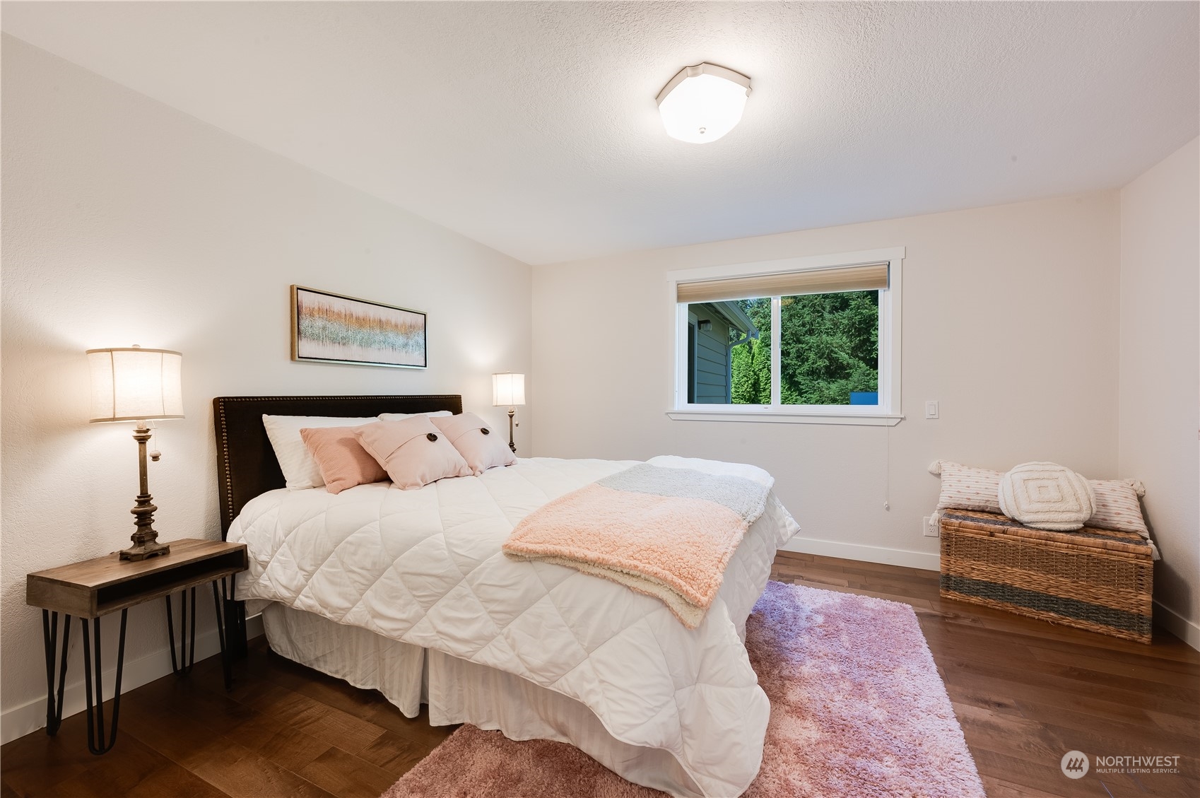 24224 16th Place Southeast Bothell, WA 98021 - Photo 23 of 37 a bedroom with a bed and a window