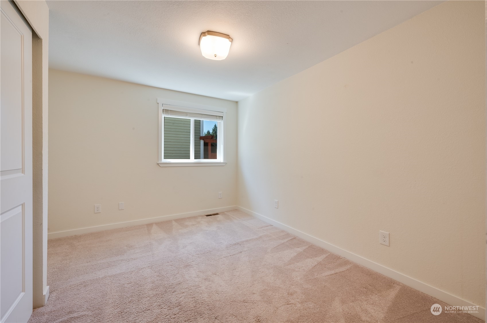 24224 16th Place Southeast Bothell, WA 98021 - Photo 28 of 37 an empty room with a window