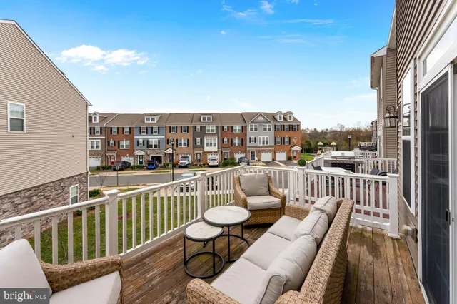 a view of balcony with furniture