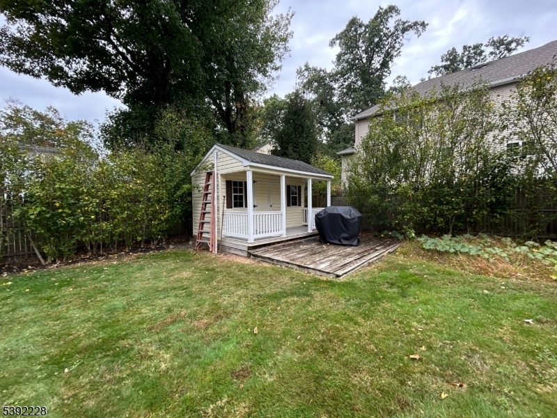 63 Grant Avenue East Hanover, NJ 07936 - Photo 19 of 19 a front view of a house with garden