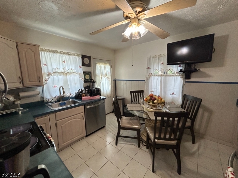 63 Grant Avenue East Hanover, NJ 07936 - Photo 5 of 19 a view of a dining room with furniture and chandelier