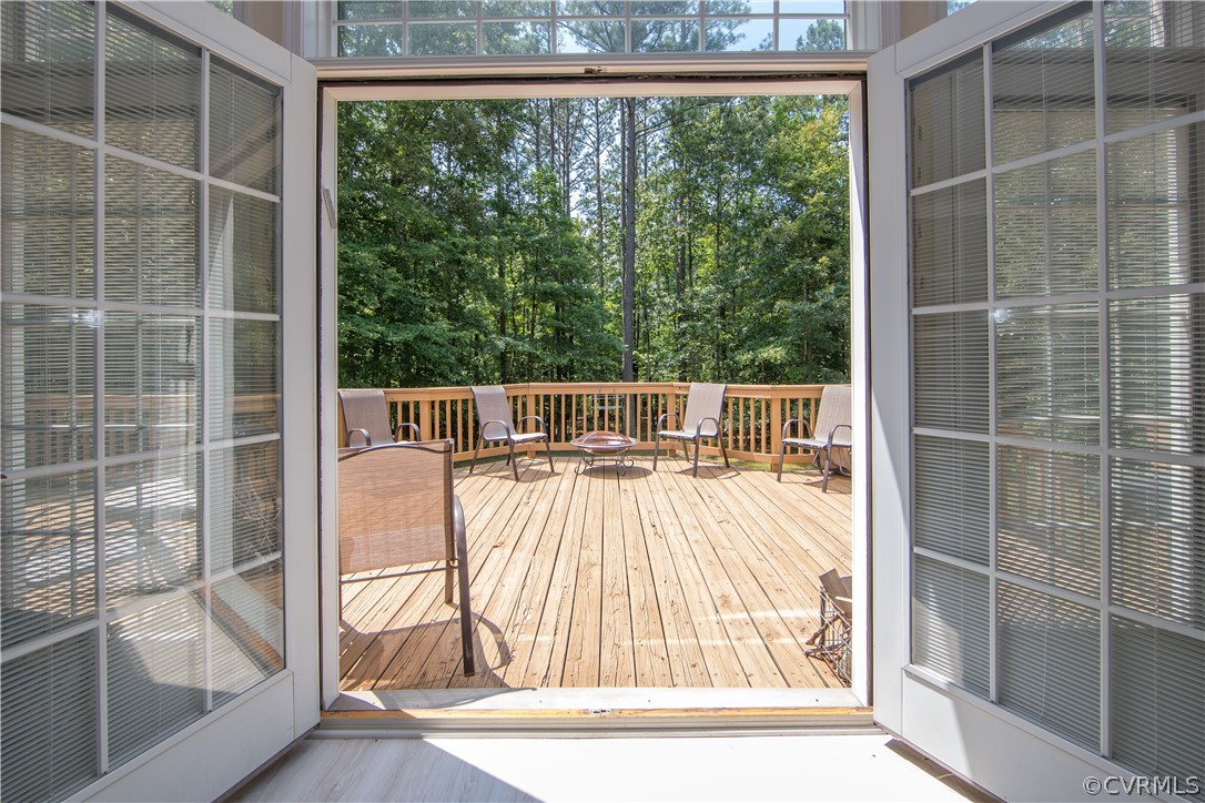 1841 Covington Road Crozier, VA 23039 - Photo 18 of 50 a view of a wooden deck with large windows